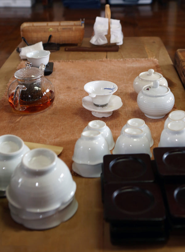 Host preparing tea during a traditional Korean darye tea ceremony
